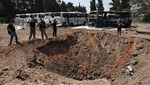 Jejak Serangan Rudal Iran di Herzliya Israel Tengah