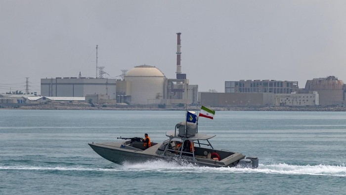 Basij paramilitary force speed boats are sailing along the Persian Gulf during the Islamic Revolutionary Guard Corps (IRGC) marine parade to commemorate Persian Gulf National Day, near the Bushehr nuclear power plant in the seaport city of Bushehr, Bushehr province, in the south of Iran, on April 29, 2024. Persian Gulf National Day, which celebrates the expulsion of the Portuguese from the Strait of Hormuz and the Persian Gulf in 1622 by the Safavid forces led by Imam Quli Khan under the command of Shah Abbas I, is observed on the 10th of Ordibehesht in the Iranian calendar, typically falling in late April or early May. (Photo by Morteza Nikoubazl/NurPhoto via Getty Images)