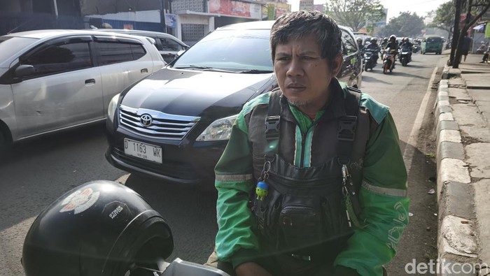 Yayat, ojol yang kerap tolak orderan lantaran kapok lewat Jalan AH Nasution saat sore hari.