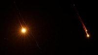 Missiles launched from Iran towards Israel are seen from Tubas, in the Israeli-occupied West Bank, June 18, 2025. REUTERS/Raneen Sawafta