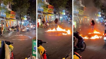 Influencer melakukan aksi berbahaya dengan api di jalan yang ramai, memamerkan aksi tak terkendali untuk mendapatkan view.Foto: Boredpanda