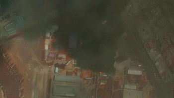 Gambar menunjukkan gedung-gedung yang terbakar di Fasilitas Produksi Elektronik Shiraz | Lihat gambar resolusi tinggi di sini Foto: Satellite image ©2025 Maxar Technologies