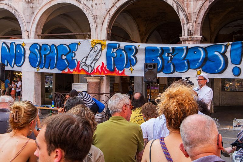 People participate in the protest against the wedding of Jeff Bezos in Venice, Italy, on June 13, 2025 (Photo by Lucrezia Granzetti/NurPhoto via Getty Images)