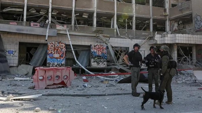 Emergency personnel work at an impact site following Iran’s missile strike on Israel, amid the Iran-Israel conflict, in Haifa, Israel, on June 20, 2025. (Reuters)