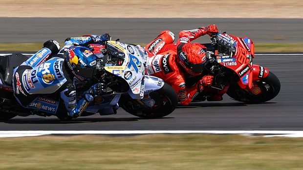 MotoGP - British Grand Prix - Silverstone Circuit, Silverstone, Britain - May 25, 2025 BK8 Gresini Racing MotoGP's Alex Marquez and Ducati Lenovo Team's Marc Marquez in action during the race Action Images via Reuters/Andrew Boyers