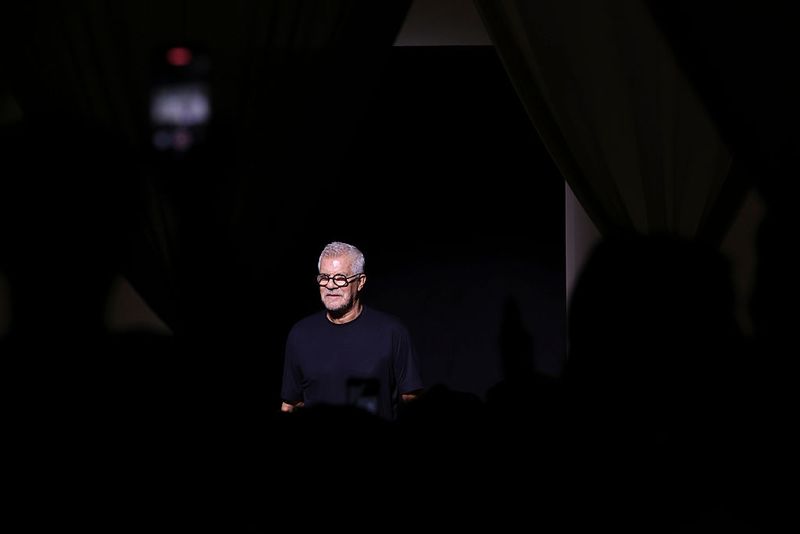 MILAN, ITALY - JUNE 21:  fashion designer Leo Dell'Orco acknowledges the audience at the Emporio Armani fashion show during the Milan Menswear Spring/Summer 2026 Fashion Week on June 21, 2025 in Milan, Italy. (Photo by Pietro D'Aprano/Getty Images)