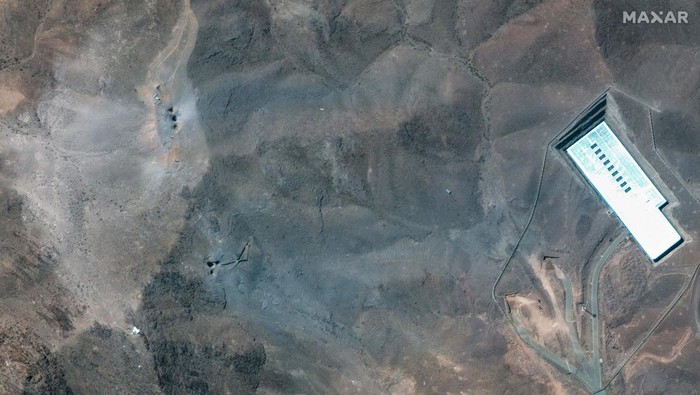 A satellite view shows an overview of Fordow underground complex, after the U.S. struck the underground nuclear facility, near Qom, Iran June 22, 2025. MAXAR TECHNOLOGIES/Handout via REUTERS THIS IMAGE HAS BEEN SUPPLIED BY A THIRD PARTY. NO RESALES. NO ARCHIVES. MANDATORY CREDIT. DO NOT OBSCURE LOGO.