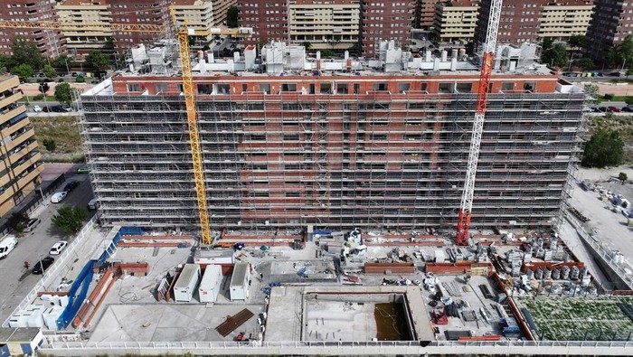 A drone view shows a building under construction in the Sesena housing development, south of Madrid, Spain June 2, 2025. REUTERS/Guillermo Martinez