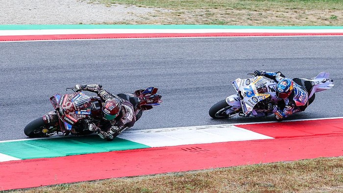 SCARPERIA, FIRENZE, ITALY - 2025/06/22: (L-R) Marc Marquez of Spain and Ducati Lenovo Team with Alex Marquez of Spain and BK8 Gresini Racing MotoGP are seen in action during the MotoGP GP9 Gran Premio dItalia Brembo - Race at Mugello Circuit. (Photo by Fabrizio Carabelli/SOPA Images/LightRocket via Getty Images)
