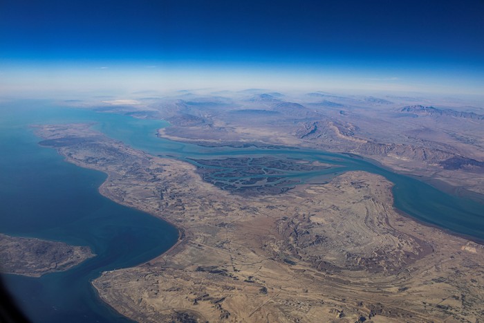 FILE PHOTO: An aerial view of the Iranian shores and the island of Qeshm in the strait of Hormuz, December 10, 2023. REUTERS/Stringer/File Photo
