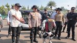 Penampakan Puluhan Robot Pakai Atribut Polisi Mondar-mandir di Monas