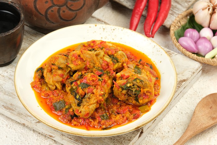 ayam rica rica kemangi,Spicy basil chicken is a Indonesian food, Indonesia traditional cuisine. Manadonese chicken dish