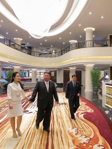 North Korean leader Kim Jong Un and his daughter Kim Ju Ae stand on a balcony facing the beach during a ceremony to celebrate the completion of the Wonsan Kalma Coastal Tourist Zone, in Wonsan, in North Korea, June 24, 2025.  KCNA via REUTERS    ATTENTION EDITORS - THIS IMAGE WAS PROVIDED BY A THIRD PARTY. REUTERS IS UNABLE TO INDEPENDENTLY VERIFY THIS IMAGE. NO THIRD PARTY SALES. SOUTH KOREA OUT. NO COMMERCIAL OR EDITORIAL SALES IN SOUTH KOREA.     TPX IMAGES OF THE DAY