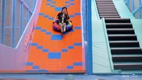 Asyiknya main seluncuran