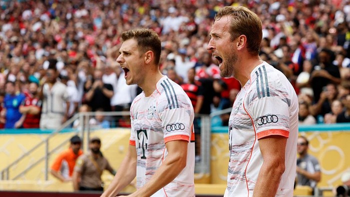 MIAMI GARDENS, FLORIDA - JUNE 29: Josip Stanisic of Bayern Munich and Harry Kane of Bayern Munich celebrate after scoring his 2nd goal during the FIFA Club World Cup 2025 round of 16 match between CR Flamengo and FC Bayern München at Hard Rock Stadium on June 29, 2025 in Miami Gardens, Florida. (Photo by Richard Sellers/Sportsphoto/Allstar via Getty Images)