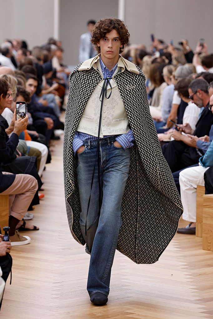 PARIS, FRANCE - JUNE 27: (EDITORIAL USE ONLY - For Non-Editorial use please seek approval from Fashion House) A model walks the runway during the Dior Homme Menswear Spring/Summer 2026 show as part of Paris Fashion Week on June 27, 2025 in Paris, France. (Photo by Estrop/Getty Images)