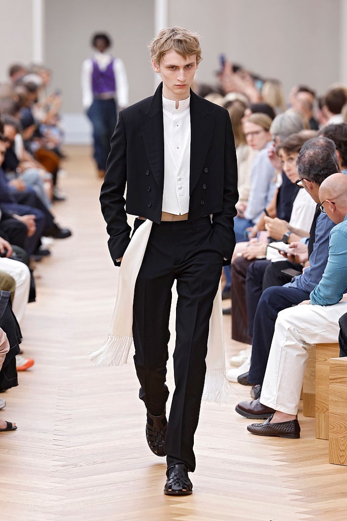 PARIS, FRANCE - JUNE 27: (EDITORIAL USE ONLY - For Non-Editorial use please seek approval from Fashion House) A model walks the runway during the Dior Homme Menswear Spring/Summer 2026 show as part of Paris Fashion Week on June 27, 2025 in Paris, France. (Photo by Estrop/Getty Images)
