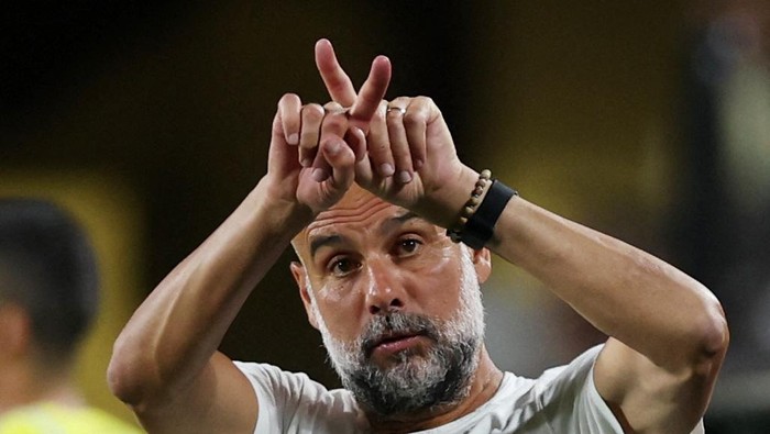 Soccer Football - FIFA Club World Cup - Round of 16 - Manchester City v Al Hilal - Camping World Stadium, Orlando, Florida, U.S. - June 30, 2025 Manchester City manager Pep Guardiola reacts at full time before extra time REUTERS/Lee Smith
