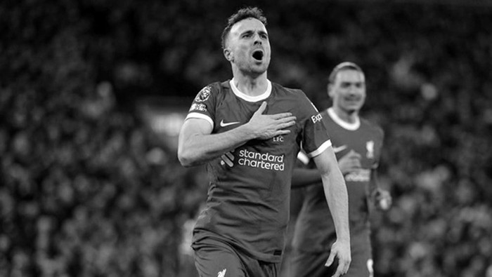 Liverpools Diogo Jota celebrates after scoring his sides first goal during the English Premier League soccer match between Liverpool and Chelsea, at Anfield Stadium, Liverpool, England, Wednesday, Jan.31, 2024. (AP Photo/Jon Super)