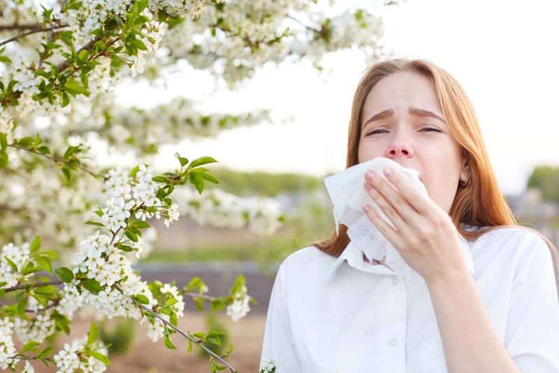 Woman Outdoors Having Allergy