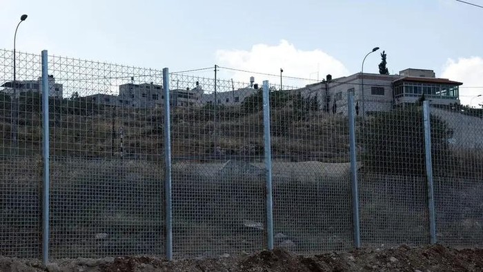 A view shows a part of the fence, which was set by the Israeli authorities, in Sinjil, near Ramallah, in the Israeli-occupied West Bank May 5, 2025. (Reuters)