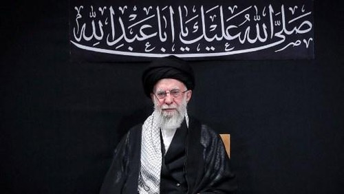 This handout picture released by the office of Irans Supreme Leader Ayatollah Ali Khamenei on July 5, 2025 shows him (R) waving to the audience during a mourning ceremony in Tehran marking the ninth day of the Islamic month of Muharram in the lead-up to Ashura, a 10-day period commemorating the seventh century killing of Prophet Mohammeds grandson Imam Hussein. Irans supreme leader on July 5 made his first public appearance since the outbreak of his countrys recent 12-day war with Israel, state media reported, greeting worshippers and being cheered at a mosque in a video broadcast by state television. (Photo by LEADER OFFICE / AFP) / === RESTRICTED TO EDITORIAL USE - MANDATORY CREDIT AFP PHOTO / HO / KHAMENEI.IR - NO MARKETING NO ADVERTISING CAMPAIGNS - DISTRIBUTED AS A SERVICE TO CLIENTS ===