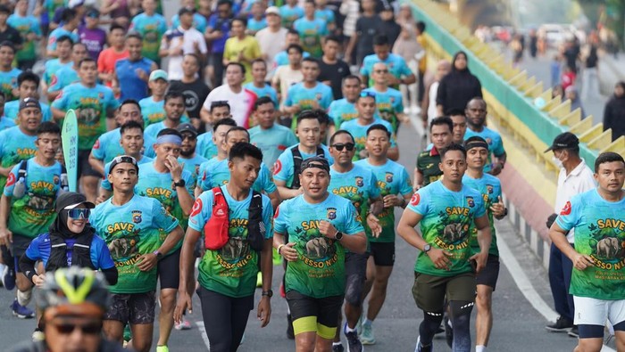 Polda Riau menggelar gladi Riau Bhayangkara Run 2025, Minggu (6/7/2025).