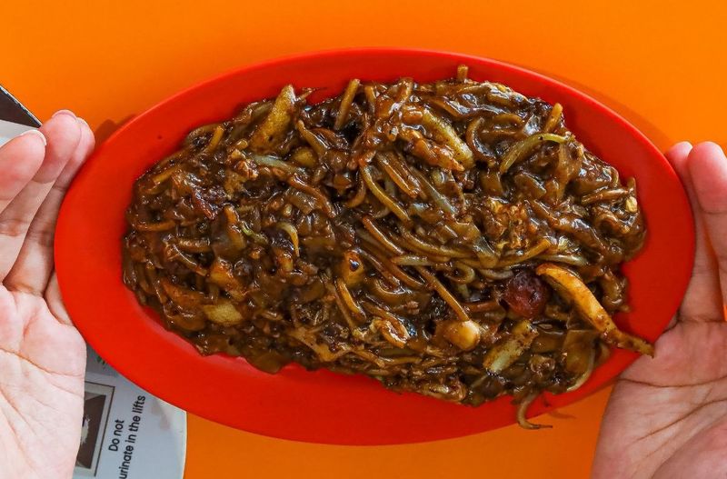 kedai char kway teow legendaris yang ada di kawasan Ang Mo Kio, Singapura.