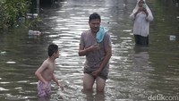 Perumahan Taman Mangu Indah, Pondok Aren, Tangerang Selatan, terpantau banjir, Selasa (8/7/2025).
