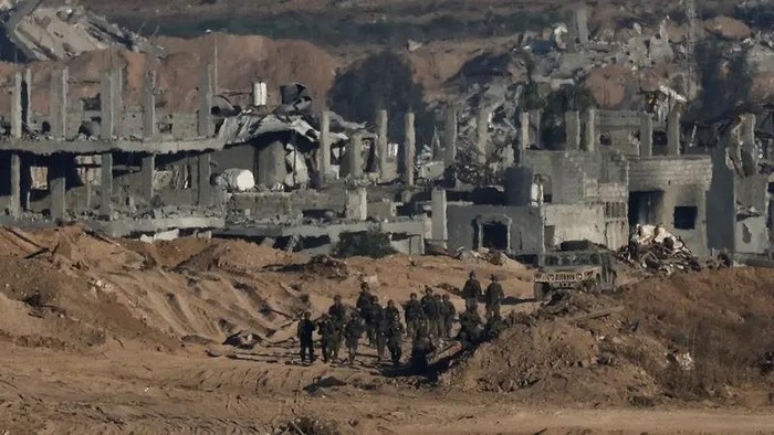 Israeli soldiers operate in Gaza, as seen from the Israeli side of the border, July 6, 2025. (Reuters)