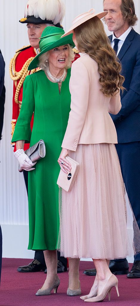 WINDSOR, ENGLAND - JULY 8: Queen Camilla and Catherine, Princess of Wales during the formal welcome at the Royal Dais on July 8, 2025 in Windsor, England. President Emmanuel Macron and Mrs Brigitte Macron visit the UK in the first visit State Visit made by France in 17 years. They are staying at Windsor Castle, hosted by King Charles III and Queen Camilla, and a banquet will be held there in their honour. The Macrons will visit Imperial College, and the President will address Parliament during his stay. (Photo by Mark Cuthbert/UK Press via Getty Images)