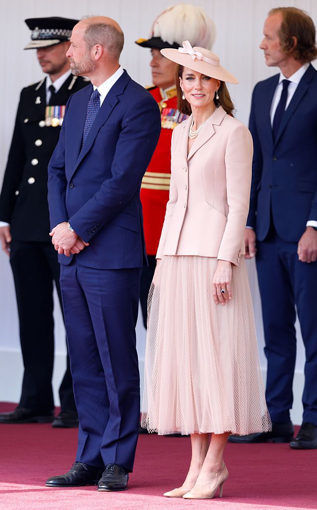 WINDSOR, UNITED KINGDOM - JULY 08: (EMBARGOED FOR PUBLICATION IN UK NEWSPAPERS UNTIL 24 HOURS AFTER CREATE DATE AND TIME) Prince William, Prince of Wales and Catherine, Princess of Wales attend the formal welcome, at the Royal Dais, Datchet Road, for French President Emmanuel Macron and Brigitte Macron on day one of their State Visit to the United Kingdom on July 8, 2025 in Windsor, England. President Emmanuel Macron and Mrs Brigitte Macron visit the UK in the first visit State Visit made by France in 17 years. They are staying at Windsor Castle, hosted by King Charles III and Queen Camilla, and a banquet will be held there in their honour. The Macrons will visit Imperial College, and the President will address Parliament during his stay. (Photo by Max Mumby/Indigo/Getty Images)