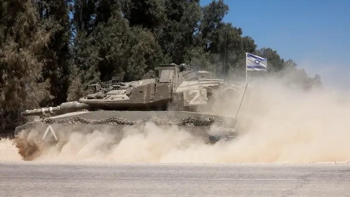 Israeli troops deploy at a position near Israels border with the Gaza Strip, on May 8, 2025, amid the ongoing war between Israel and the Palestinian militant movement Hamas. (AFP)