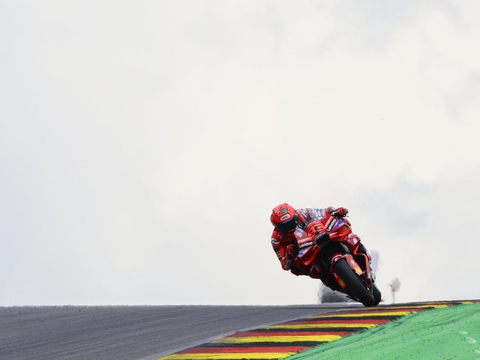 HOHENSTEIN-ERNSTTHAL, GERMANY - JULY 11: Marc Marquez of Spain riding the Lenovo Ducati (93) during free practice ahead of the MotoGP of Germany at Sachsenring Circuit on July 11, 2025 in Hohenstein-Ernstthal, Germany. (Photo by Gold & Goose Photography/Getty Images)