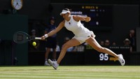 Anisimova pun menjadi pemain pertama sejak 1911 yang kalah 0-6, 0-6 di final Wimbledon. Petenis Amerika Serikat itu menembus final setelah bikin kejutan dengan menyingkirkan unggulan pertama, Aryna Sabalenka. Foto: REUTERS/Stephanie Lecocq