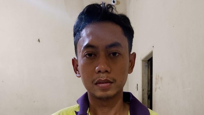 Tampang Agus Wandana yang tega membacok istrinya. (Dok. Polres Asahan)