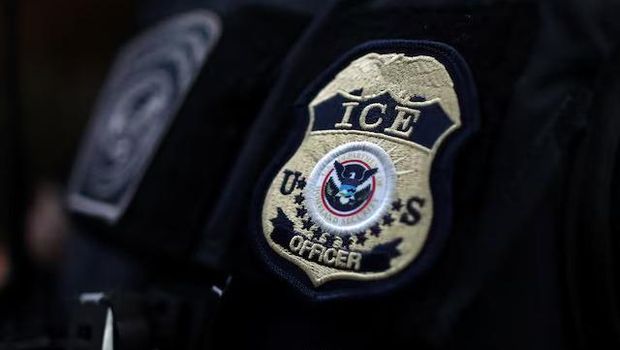 The badge of a U.S. Immigration and Customs Enforcement (ICE) officer. Hawthorne, California, U.S., March 1, 2020. REUTERS/Lucy Nicholson/File Photo Purchase Licensing Rights