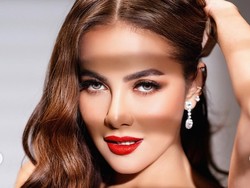 Perhiasan cincin dan anting menambah nuansa glamornya gaya Olla Ramlan. (Foto: Instagram/@riomotret)