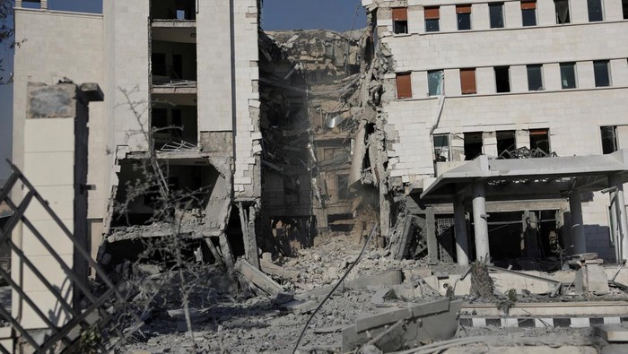 A view of a destroyed building, after powerful airstrikes shook Damascus on Wednesday, targeting the defense ministry, as Israel vowed to destroy Syrian government forces attacking Druze communities in southern Syria and demanded their withdrawal, in Damascus July 16, 2025. REUTERS/Khalil Ashawi