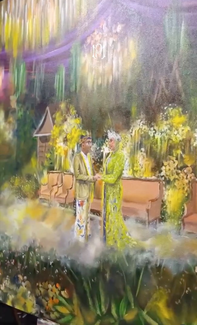 Maulana dan Putri juga menyewa jasa live painting untuk melukis momen di hari bahagia keduanya. Foto: Instagram/@putri.karlina14