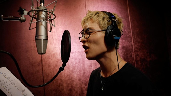 Members of K-pop boy band 1VERSE, including Hyuk and Seok, who defected from North Korea, as well as Aito, Nathan and Kenny, get some rest before they record their new track at a studio in Seoul, South Korea, June 26, 2025. REUTERS/Kim Soo-hyeon