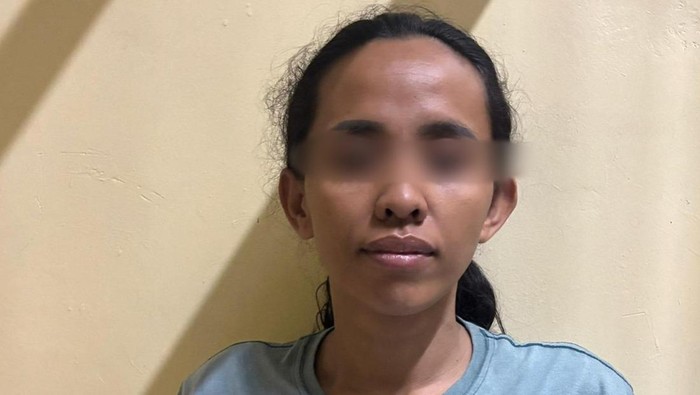 Tampang Diana saat diamankan di Polres OKU Selatan usai menggelapkan motor teman prianya.
