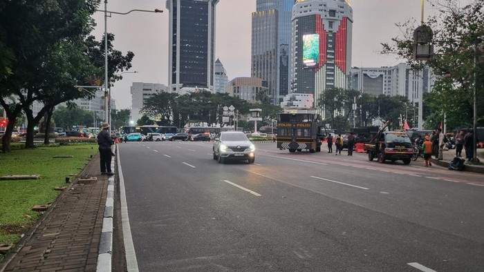 Situasi arus lalu lintas di Jalan Merdeka Selatan sudah kembali normal usai demo ojol selesai. (Taufiq/detikcom)