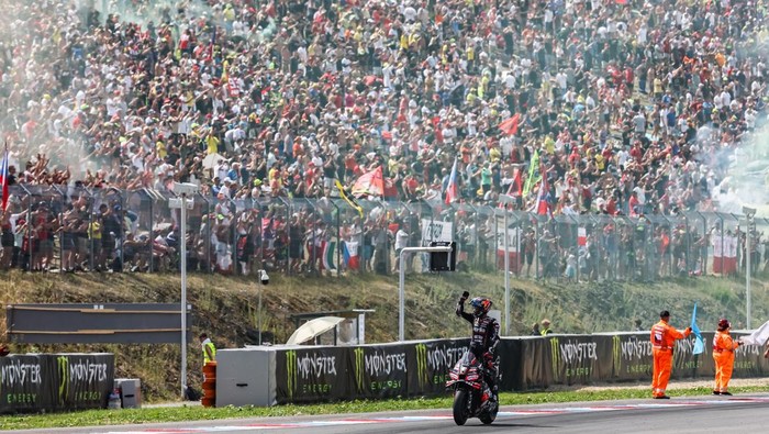 BRNO, CZECH REPUBLIC - JULY 20: Jorge Martin of Spain and  Aprilia Racing acknowledge the fans at the end of MotoGP race of the Tissot Grand Prix of Czechia on July 20, 2025 held at Automotodrom Brno in Brno, Czech Republic. (Photo by Hazrin Yeob Men Shah/Icon Sportswire via Getty Images)