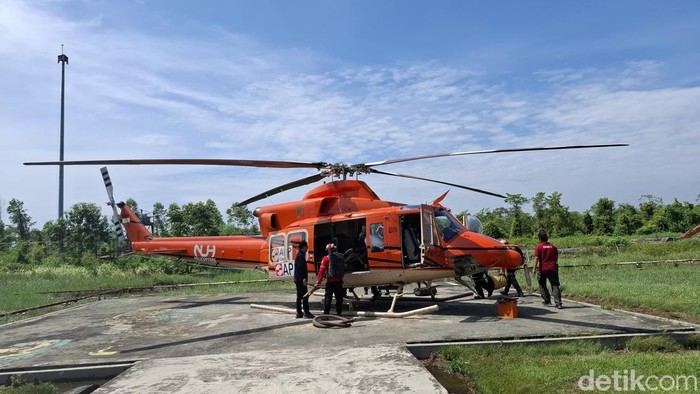 Helikopter patroli milik APP Group. (Raja Adil Siregar/detikSumut)