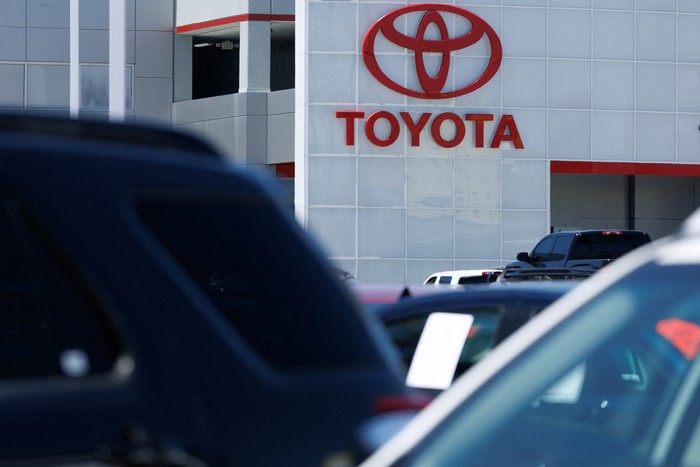 After the U.S. set a 25% tariff rate on Japan and South Korea, a Toyota sign is shown at a Toyota dealership in Tustin, California, U.S. July 7, 2025.  REUTERS/Mike Blake