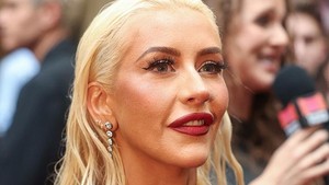 Nah sekarang, Christina bukan cuma datang sebagai tamu, tapi juga menjabat sebagai produser eksekutif untuk versi musikal panggung yang mulai tayang di Savoy Theatre, London. Foto: Getty Images/Shane Anthony Sinclair