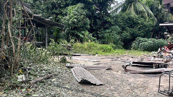 This handout picture taken and released by the Royal Thai Army on July 24, 2025 shows the debris of a damaged house by a rocket strike in Surin provinces Kap Choeng district. A Cambodian rocket strike wounded three Thai civilians on July 24, 2025, the Thai army said, as the two sides clashed over a disputed border area. (Photo by HANDOUT / ROYAL THAI ARMY / AFP) / RESTRICTED TO EDITORIAL USE - MANDATORY CREDIT 