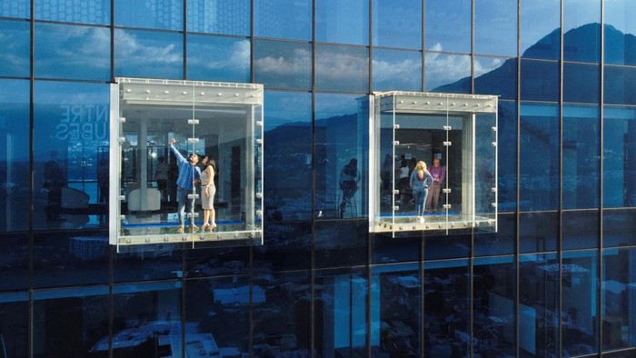 A drone view shows visitors taking pictures at new Skydeck Millennium observation deck in San Salvador, El Salvador, July 23, 2025. REUTERS/Jose Cabezas