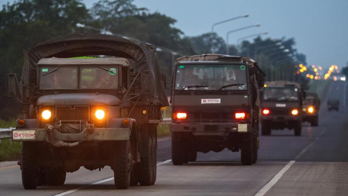 A Cambodian military personnel gestures from a BM-21 Grad multiple rocket launcher, around 40 km (24 miles) from the disputed Ta Moan Thom temple, after Thailand and Cambodia exchanged heavy artillery on Friday as their worst fighting in more than a decade stretched for a second day, in Oddar Meanchey province, Cambodia, July 25, 2025. REUTERS/Soveit Yarn